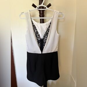 Elegant black and white lace romper